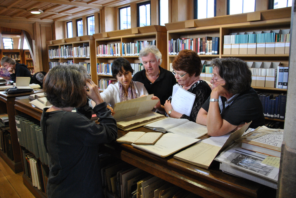 Darrelyn Gunzburg with MA Director, Nick Campion, and MA students viewing manuscripts in the Hereford Cathedral Library, MA Summer School, 2010.